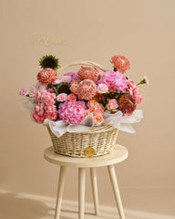 Luxury blush pink flower basket with hydrangeas, spray roses and chrysanthemums by The One Flowers with delivery across UAE