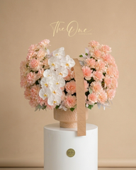 Luxury blush pink flowers and white orchid arrangement by The One Flowers UAE