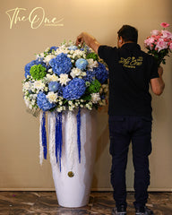 Grand luxury blue hydrangea and white rose floral arrangement by The One Flowers UAE