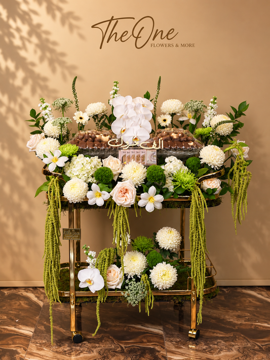 Luxury white and green flowers with premium chocolate arrangement by The One Flowers UAE