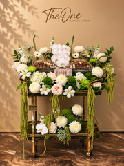 Luxury white and green flowers with premium chocolate arrangement by The One Flowers UAE