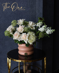 Ivory and white rose flower arrangement with hydrangea in a blush pink vase by The One Flowers & More Al Ain UAE
