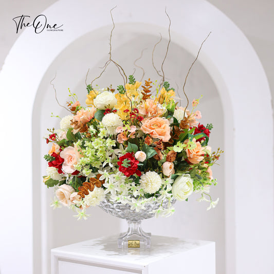 Artificial flowers with a crystal vase