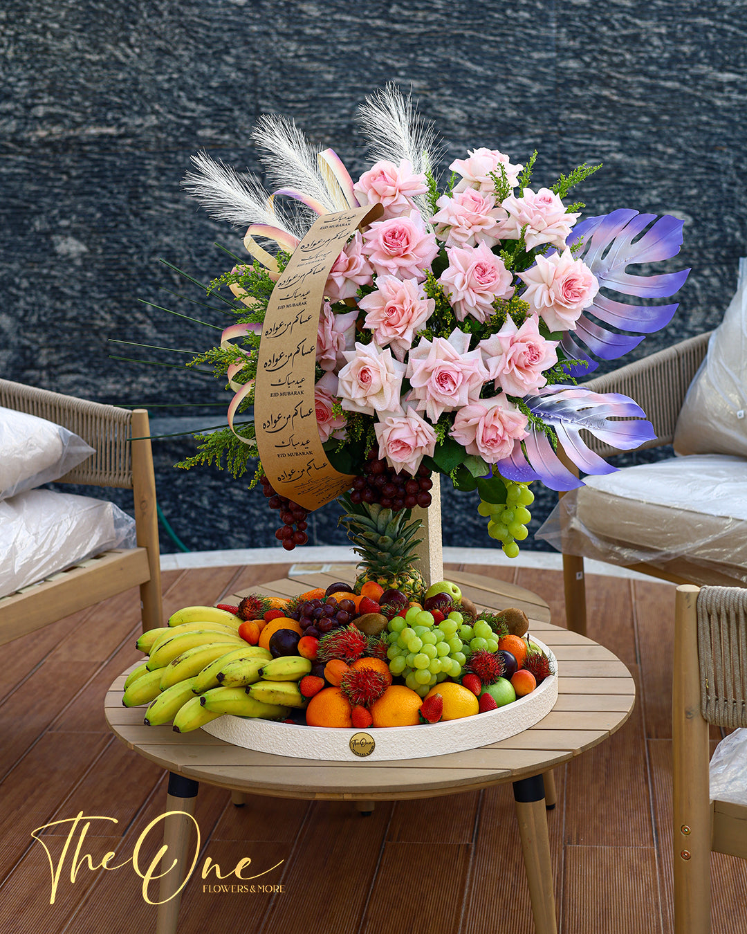 Luxury Eid Al Adha flower and fruit arrangement with white roses and fresh seasonal fruits by The One Flowers