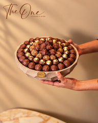 Luxury chocolate gift tray beautifully arranged with assorted wrapped chocolates by THE ONE FLOWERS, perfect for gifting and special occasions in the UAE.