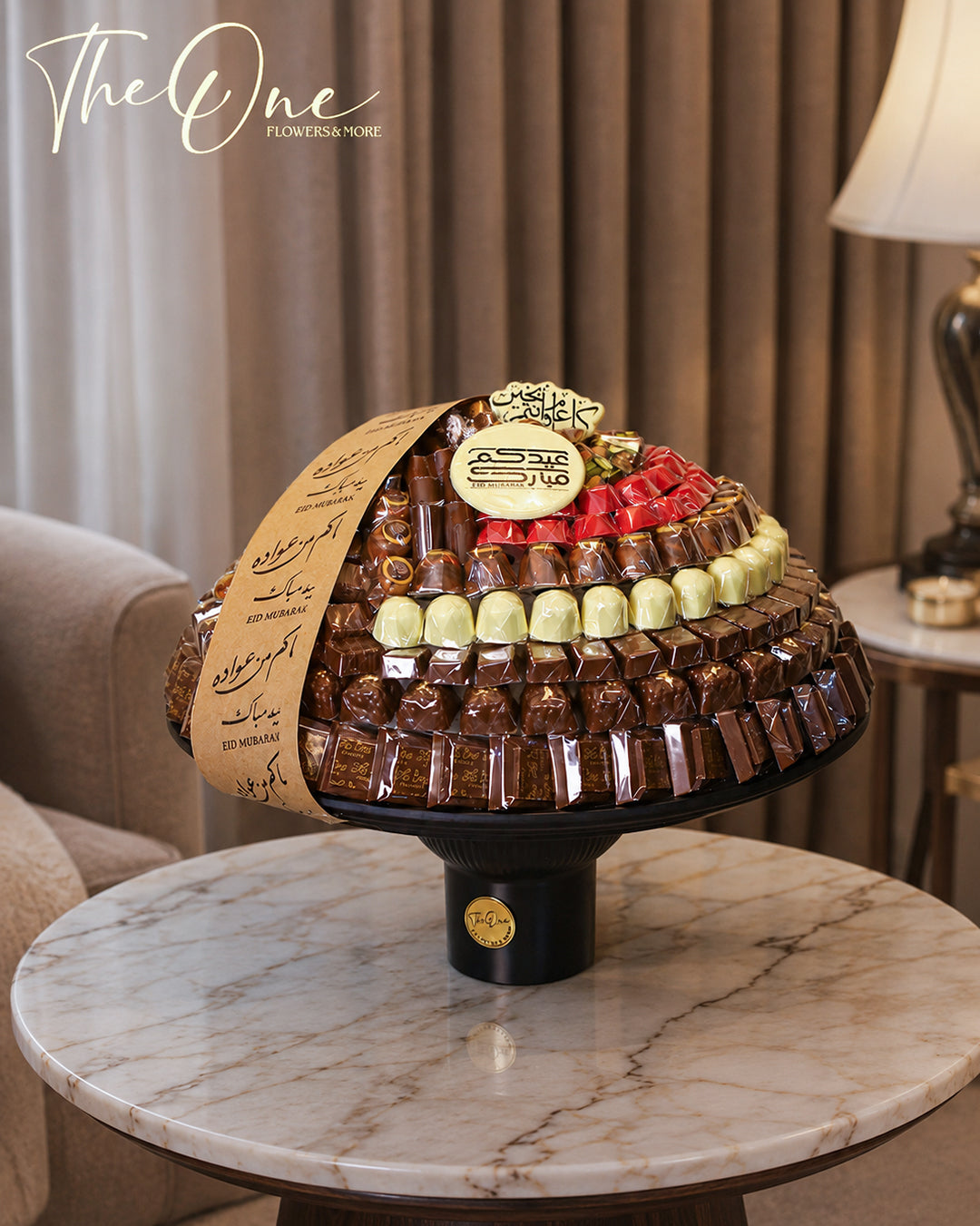 Luxury Eid Al Adha chocolate stand with premium assorted chocolates by The One Flowers