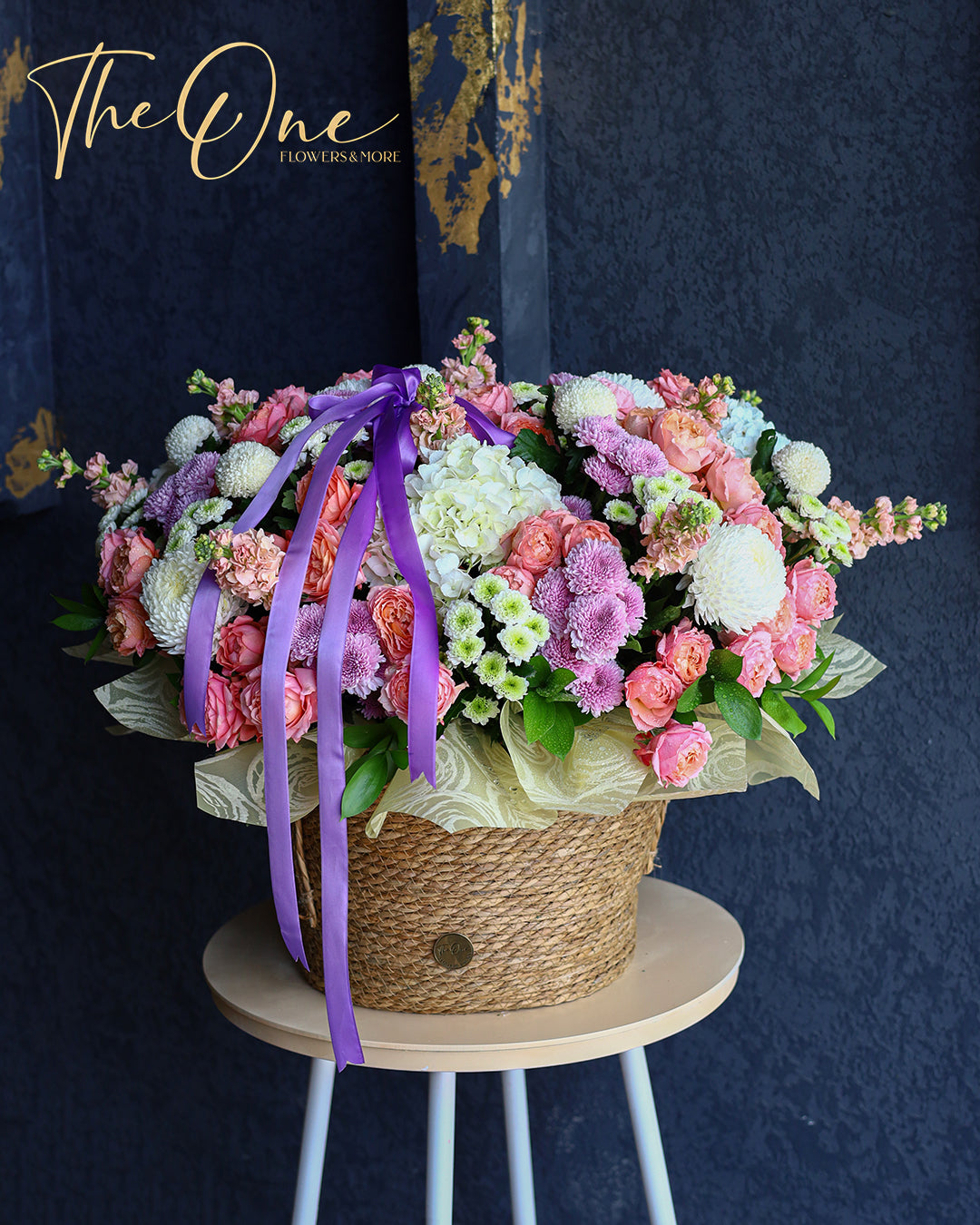 Luxury pink and lavender flower basket with roses, hydrangeas and chrysanthemums by The One Flowers UAE