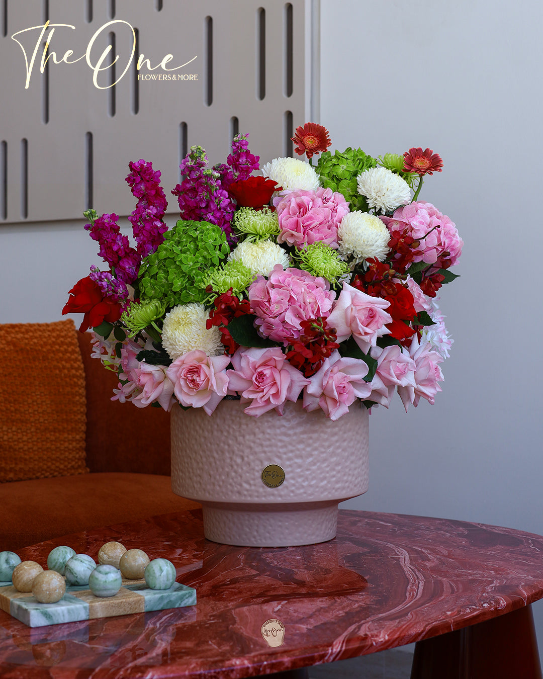 Luxury pink green and white flower arrangement with hydrangeas, roses and chrysanthemums by The One Flowers UAE
