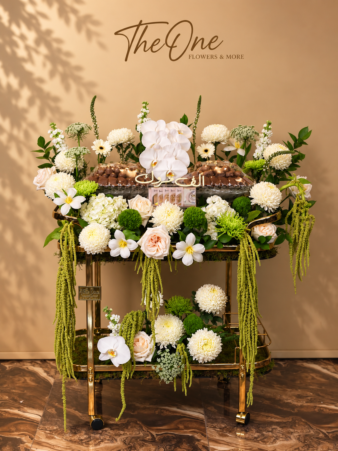 Luxury white and green flowers with premium chocolate arrangement by The One Flowers UAE