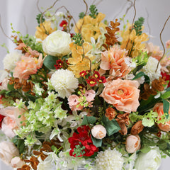 Artificial flowers with a crystal vase