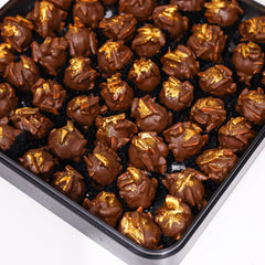 Chocolate stuffed with kinder and almonds ( 1 KG )