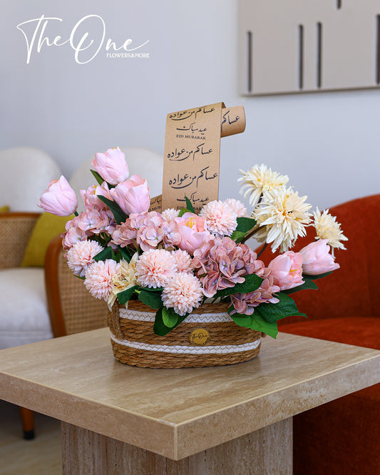 Elegant Eid Al Adha artificial flower basket in soft pink and ivory tones by The One Flowers