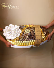 Luxury Eid Al Adha chocolate collection by The One Flowers featuring premium chocolate trays and elegant Eid gift boxes