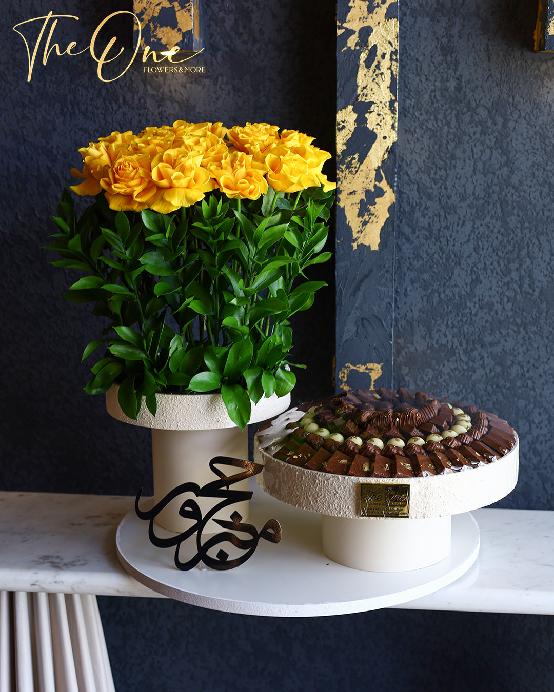 Luxury Hajj flower and chocolate arrangement by The One Flowers featuring premium fresh flowers and assorted chocolates