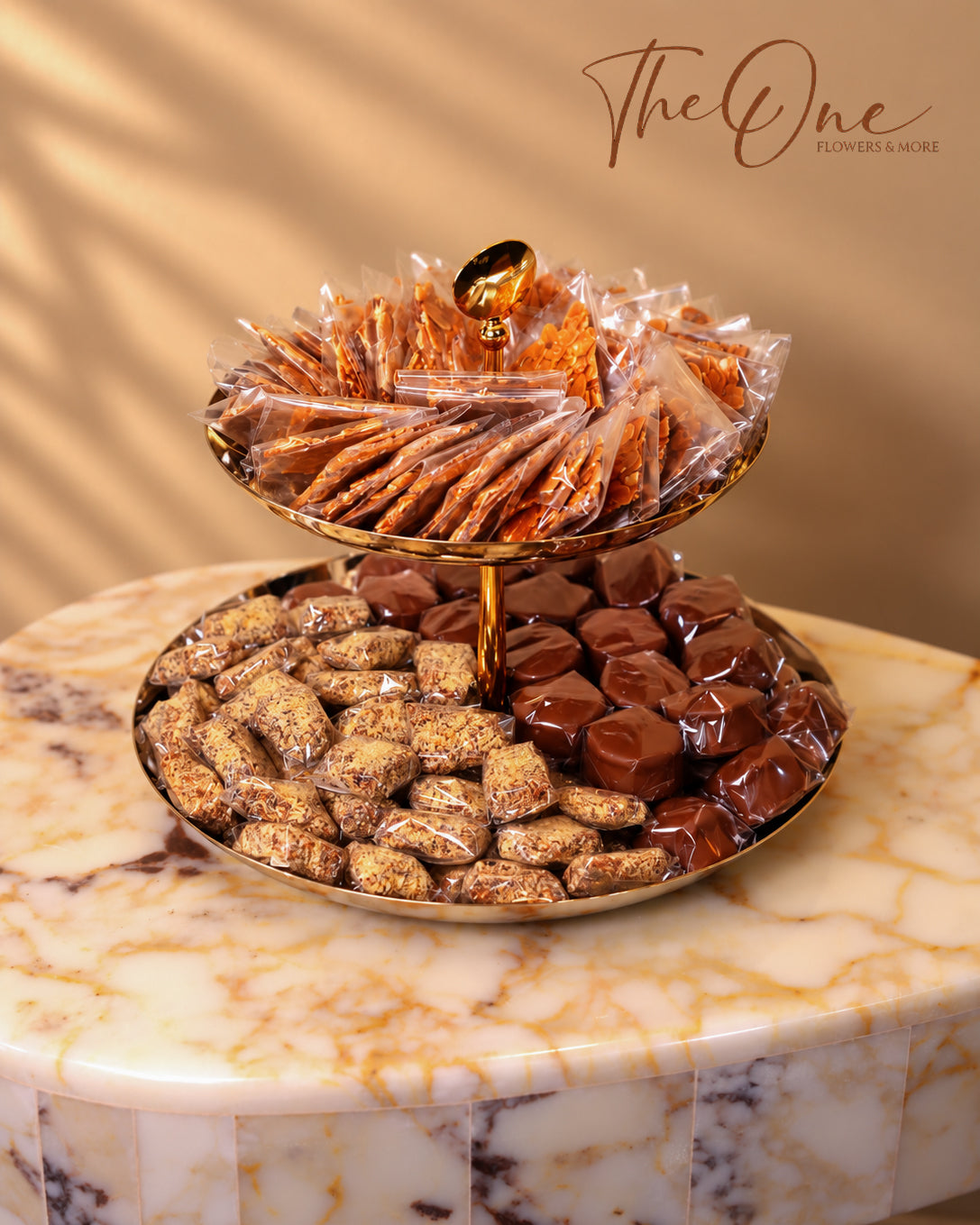 Luxury chocolate gift tray beautifully arranged with assorted wrapped chocolates by THE ONE FLOWERS, perfect for gifting and special occasions in the UAE.