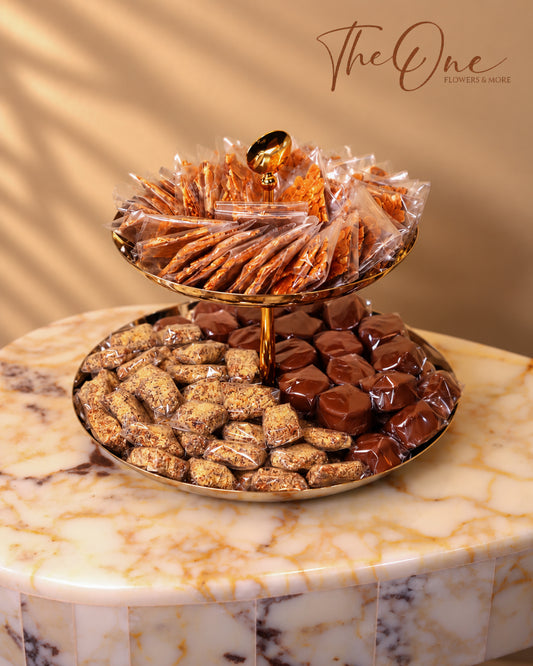 Luxury chocolate gift tray beautifully arranged with assorted wrapped chocolates by THE ONE FLOWERS, perfect for gifting and special occasions in the UAE.