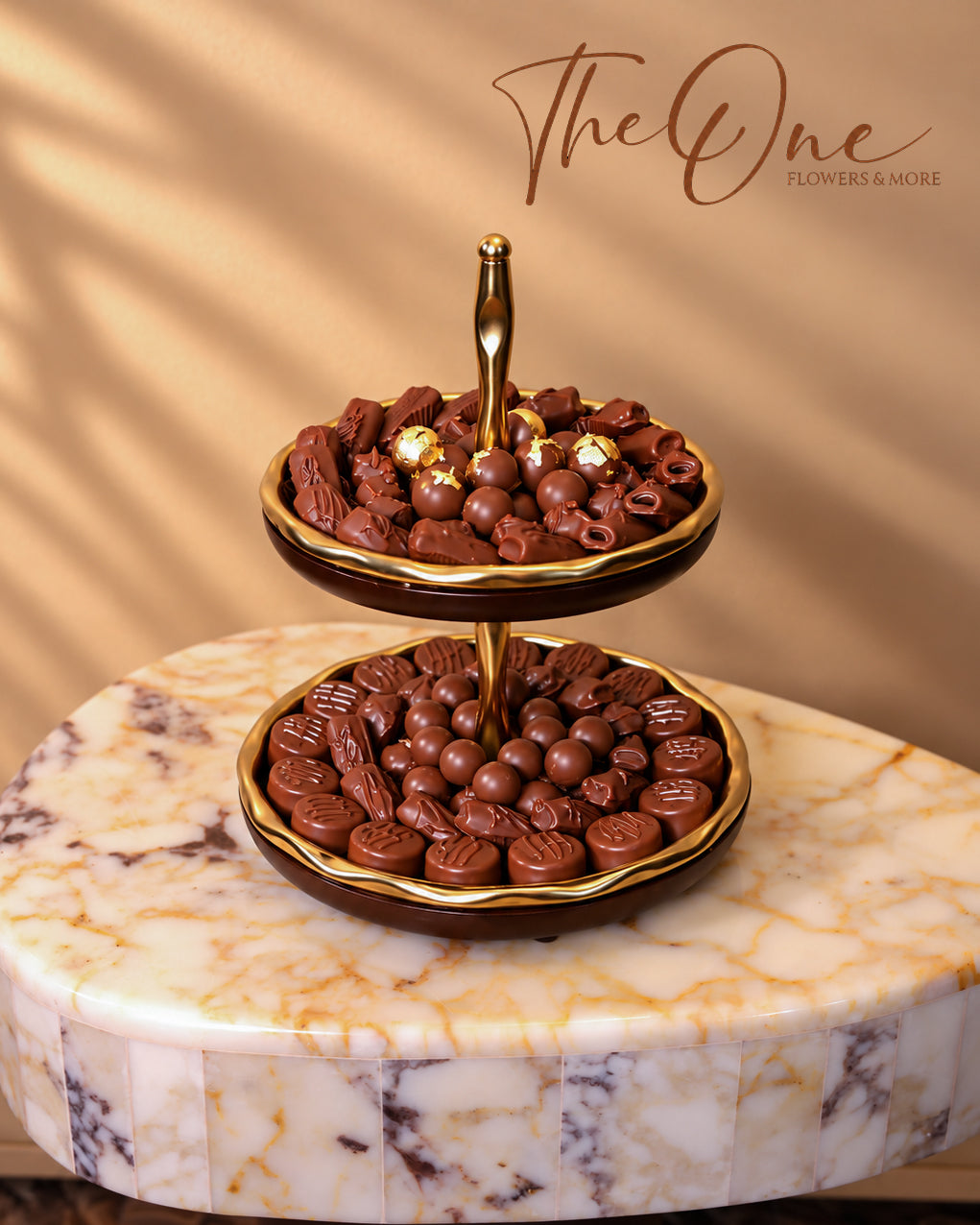Luxury chocolate gift tray beautifully arranged with assorted wrapped chocolates by THE ONE FLOWERS, perfect for gifting and special occasions in the UAE.